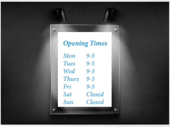 Clear acrylic sign with opening times